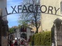 Thumbnail photo of LX Factory sign over a gate linking to LX Factory photo page